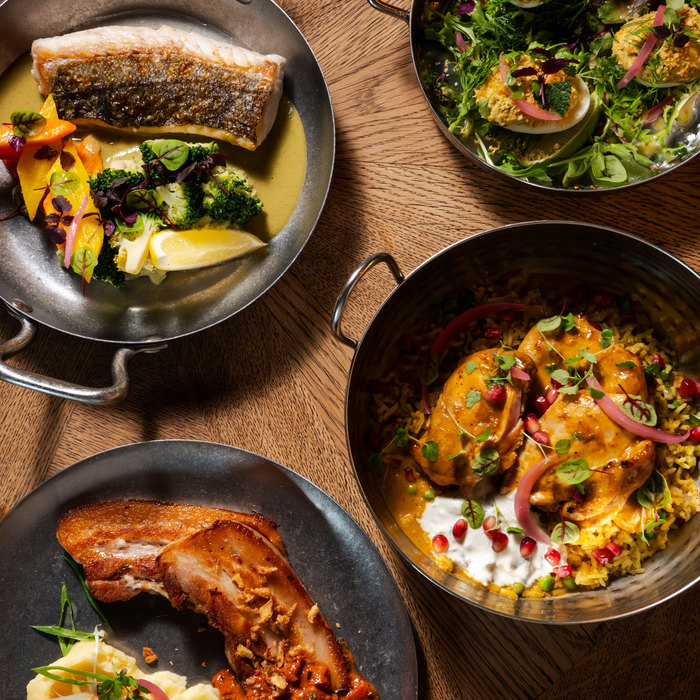 Café Hortense - plats de la carte : poisson, butter chicken, poitrine de cochon et œufs